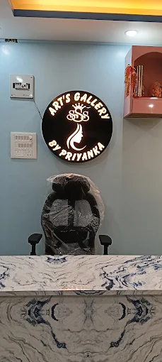 Reception desk and logo inside the gallery